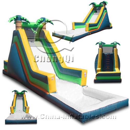 floating inflatable water slide palm tree jungle